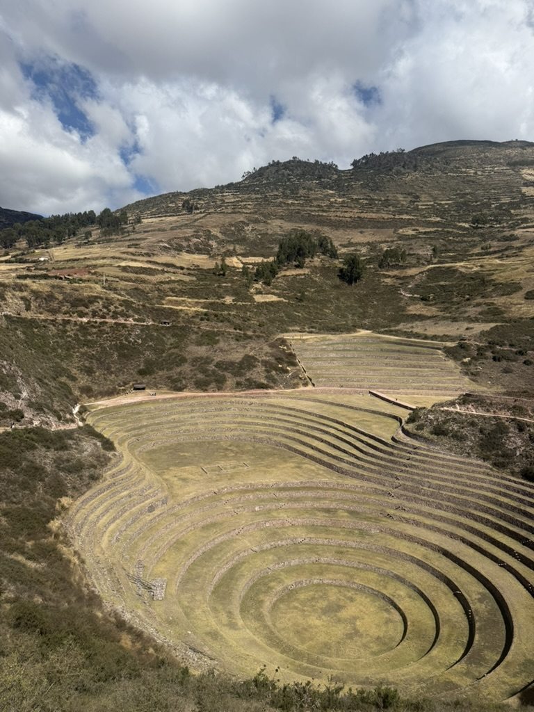 Concentric circular agricultural terraces set into a natural bowl at Moray